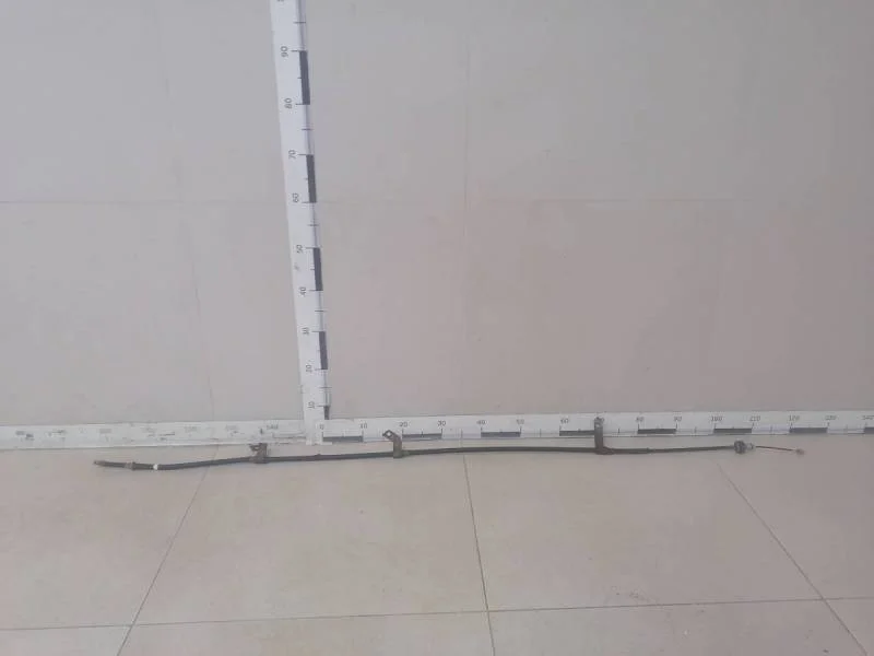 Трос стояночного тормоза левый Kia Rio 3 (UB) 2011-2017