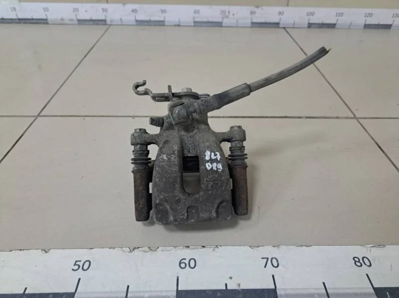 Суппорт задний правый Skoda Octavia (A7) 2013>