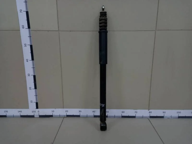 Амортизатор задний Nissan Terrano (D10) 2014>