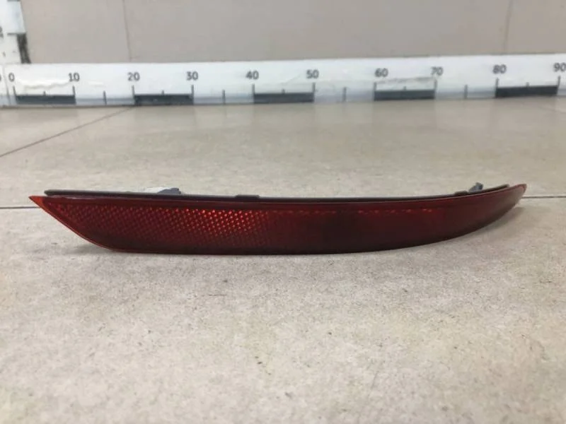 Отражатель в бампер задний правый Nissan Almera 3 (G11, G15) 2012>