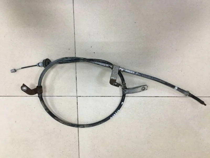 Трос стояночного тормоза левый Hyundai Solaris 2010-2017