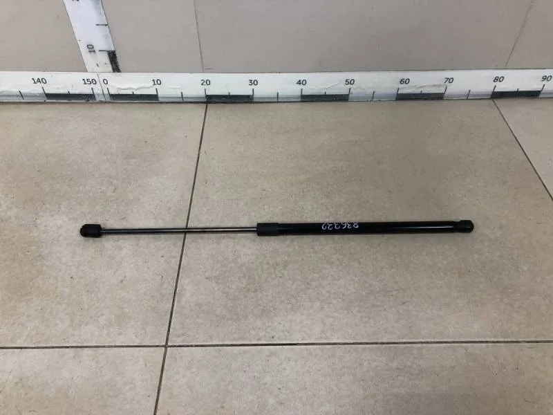 Амортизатор капота Renault Sandero 2014>