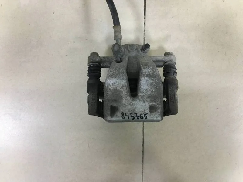 Суппорт задний левый Toyota Avensis (T250) 2003-2009