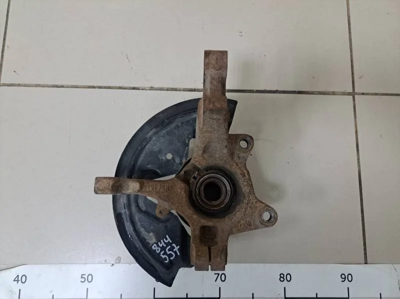 Кулак поворотный передний левый Nissan Almera 3 (G11, G15) 2012>