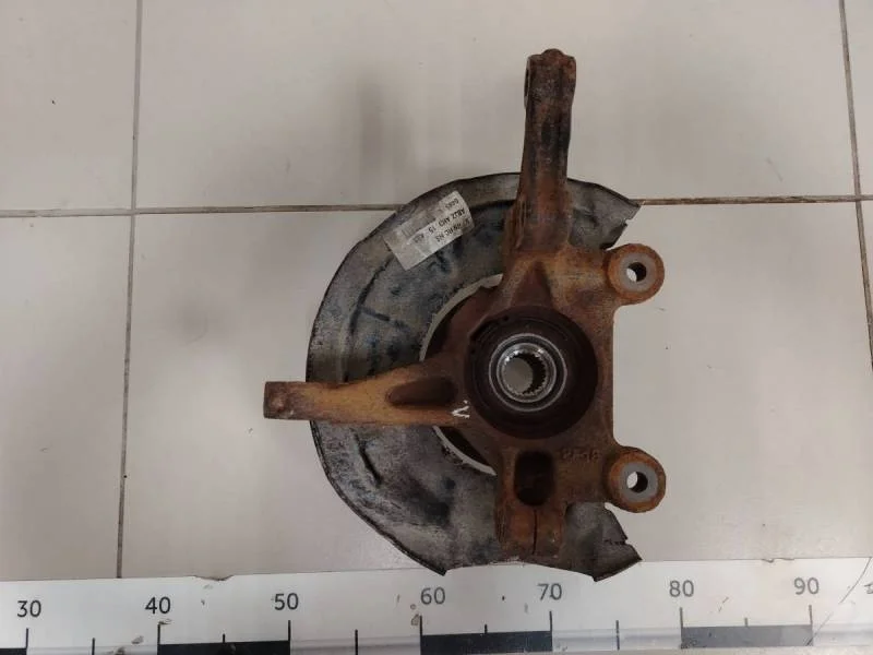 Кулак поворотный передний левый Chevrolet Aveo T300 2011>