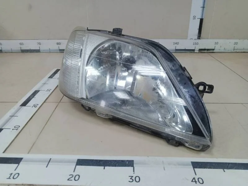 Фара правая Renault Logan (1) 2005-2014
