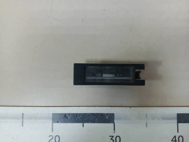 Фонарь подсветки номера Opel Corsa (D) 2006-2015