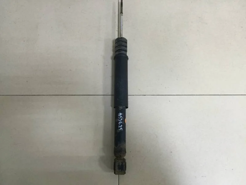 Амортизатор задний Nissan Almera 3 (G11, G15) 2012>