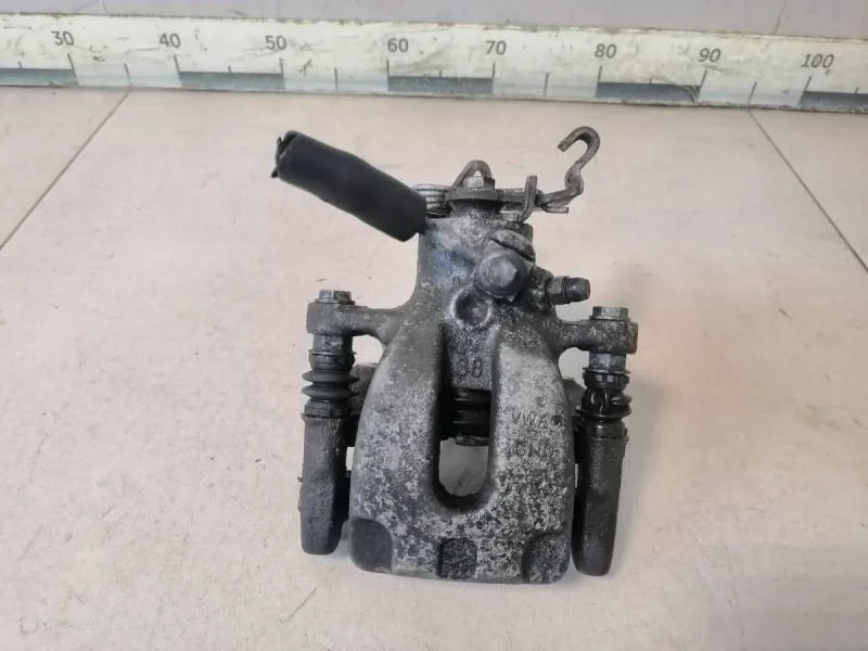 Суппорт задний левый Skoda Octavia (A7) 2013>