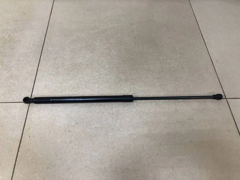 Амортизатор капота Renault Logan (2) 2014>