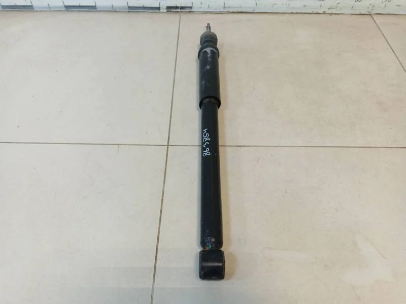 Амортизатор задний Nissan Almera 3 (G11, G15) 2012>