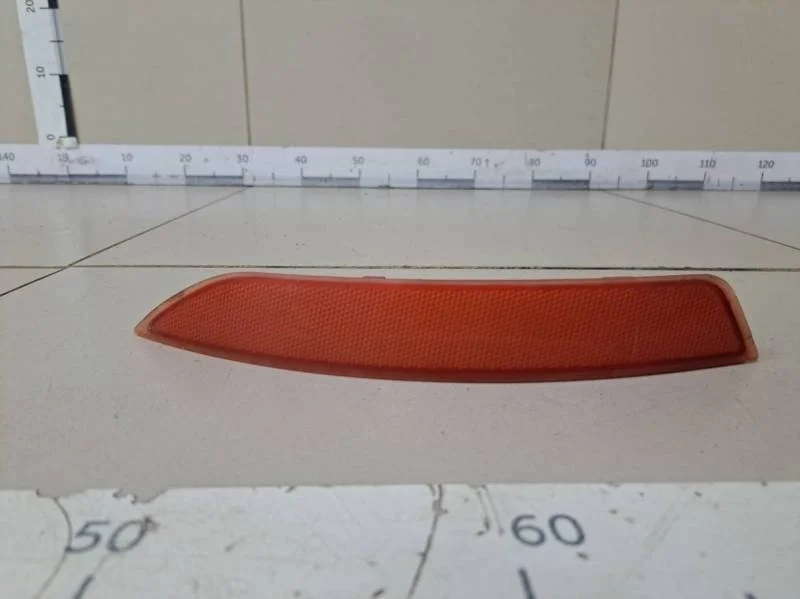 Отражатель в бампер задний левый Volkswagen Jetta (5K) 2011>