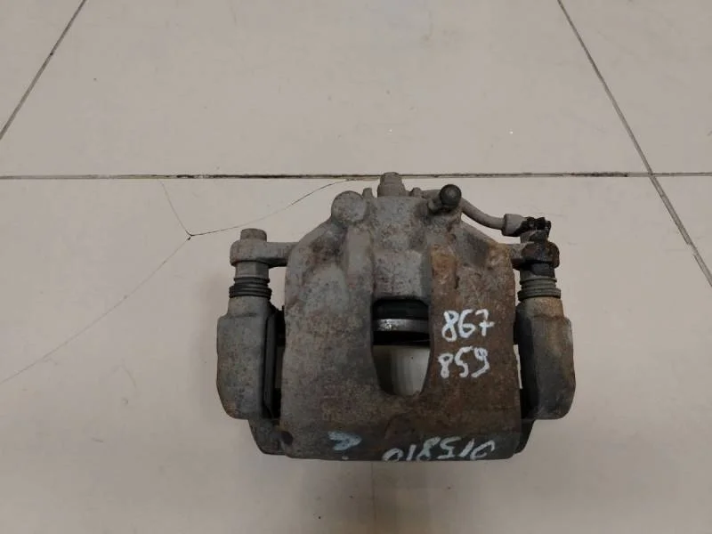 Суппорт передний левый Kia Rio 3 (UB) 2011-2017