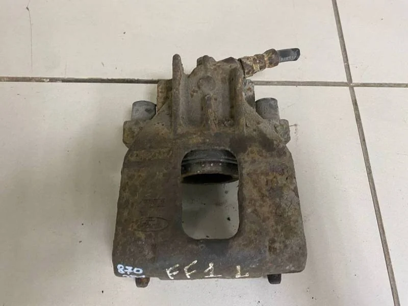 Суппорт передний левый Ford Focus 1 1998-2004