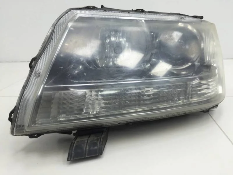 Фара левая Suzuki Grand Vitara 2005-2015