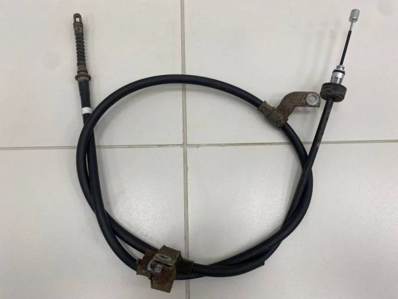 Трос стояночного тормоза левый Hyundai Solaris 2010-2017