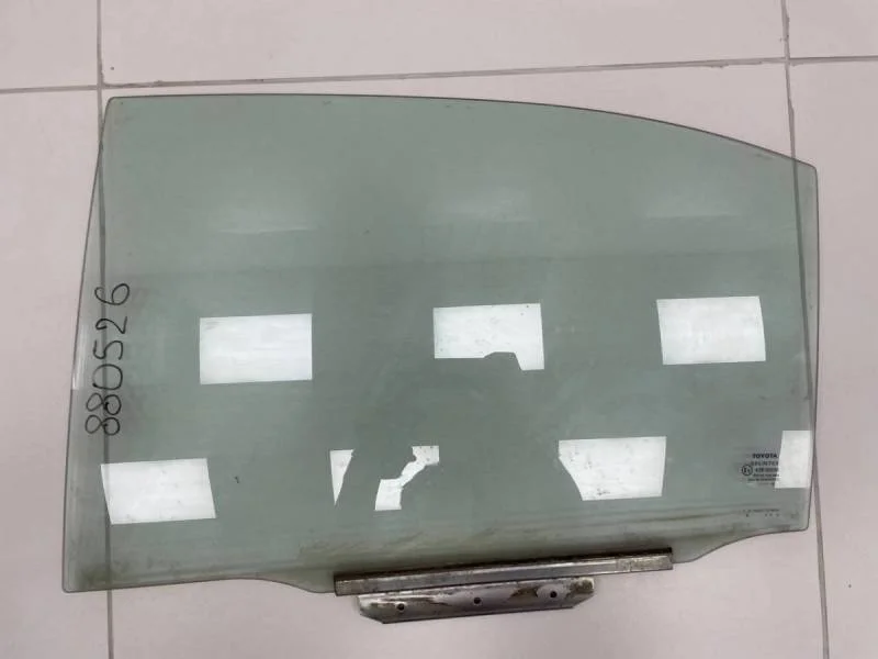 Стекло двери задней левой Toyota Avensis (T250) 2003-2009