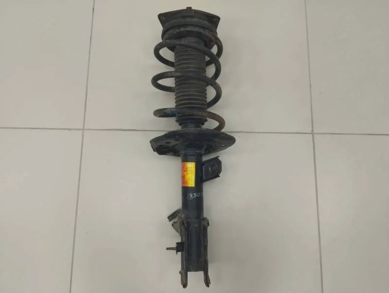 Амортизатор передний левый Nissan Qashqai (J10) 2006-2013