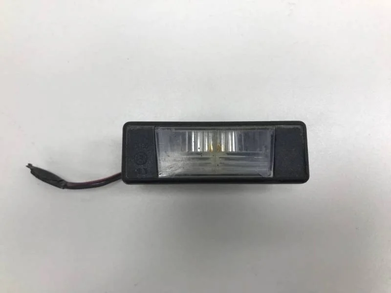 Фонарь подсветки номера Nissan Qashqai (J10) 2006-2013