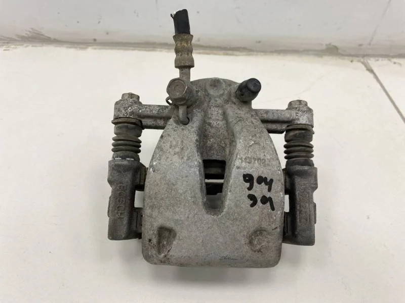 Суппорт задний левый Toyota Avensis (T250) 2003-2009