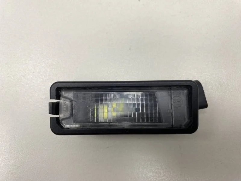 Фонарь подсветки номера Volkswagen Polo (HB) 2009>