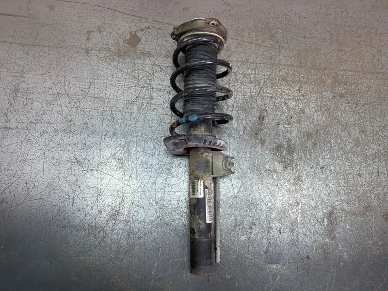 Амортизатор в сборе с пружиной Volkswagen Golf 2007 1K0413031CR УНИВЕРСАЛ BLS, передний