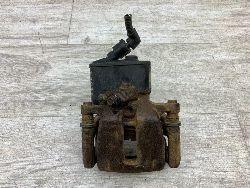 Суппорт тормозной Volkswagen Passat 2009 5N0615404 УНИВЕРСАЛ CBAB, задний правый