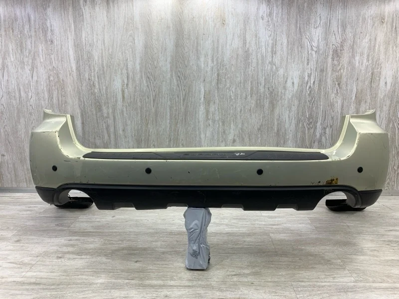 Бампер Subaru Outback 2006 57704AG060 УНИВЕРСАЛ EJ25, задний