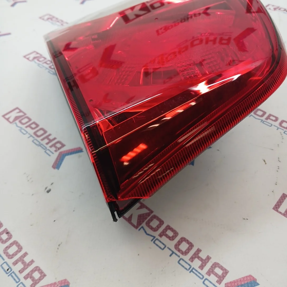 Фонарь задний Уценка новый,оригинал отколот уголок