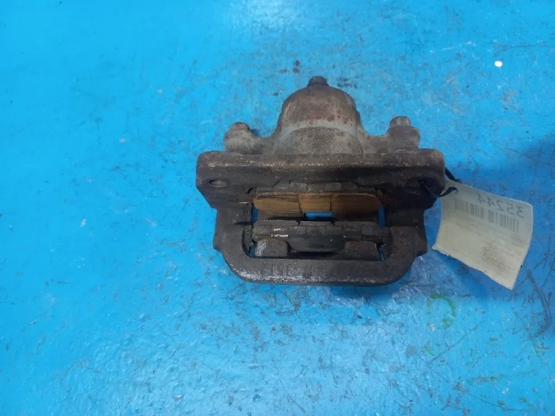 Суппорт тормозной Nissan Teana J31 2000-2007