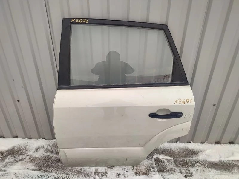 Дверь Hyundai Tucson 770032E050 JM, задняя левая