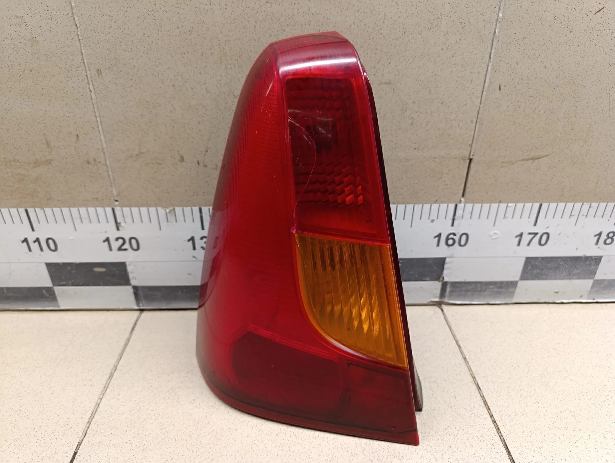 Фонарь задний левый Logan 2005-2014