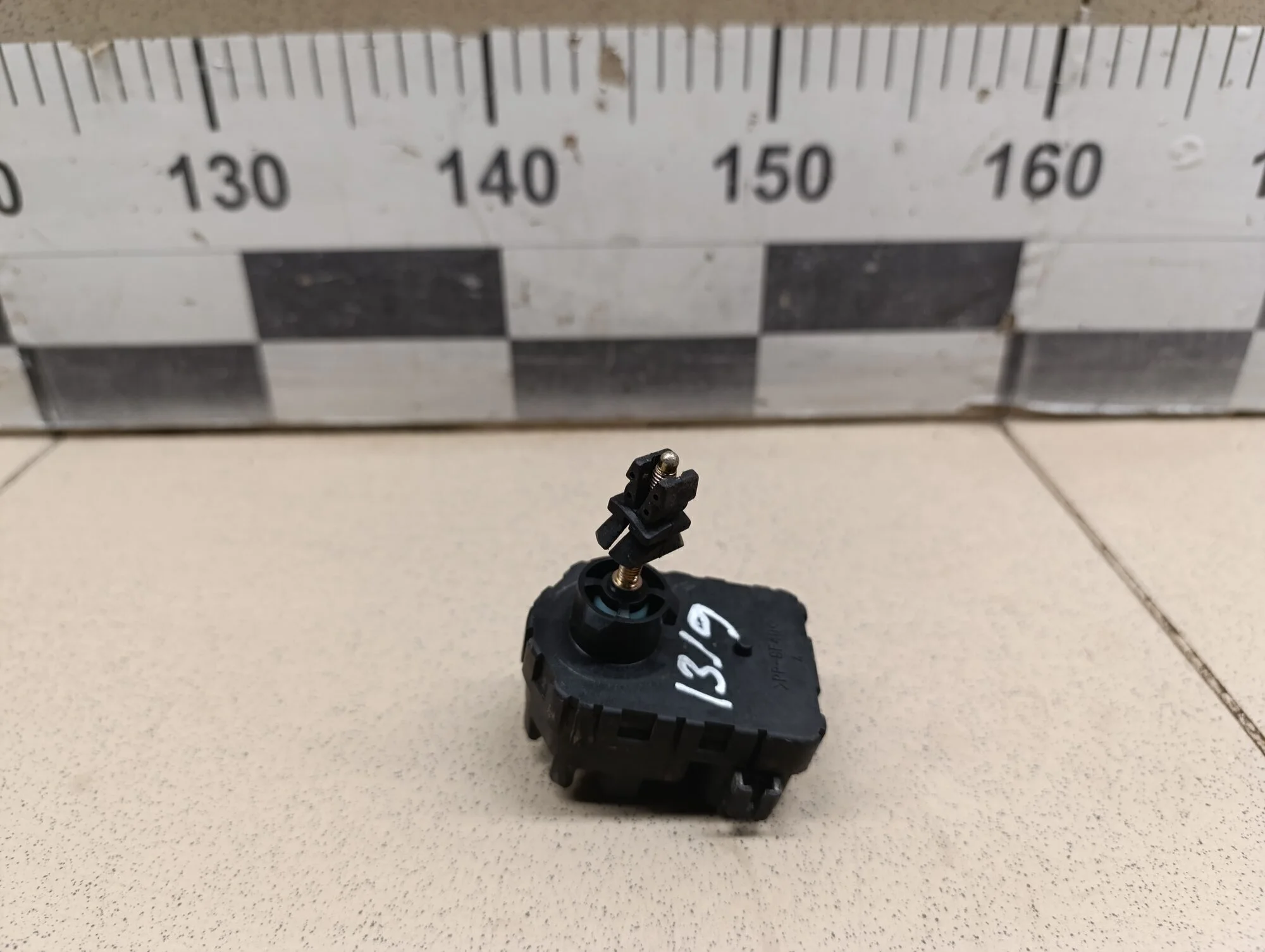 Моторчик корректора фары Corolla E12 2001-2006