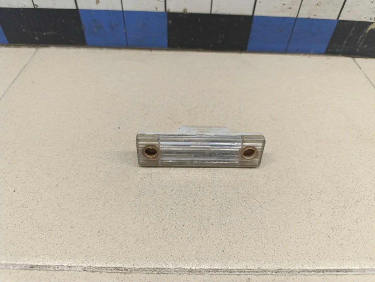 Фонарь подсветки номера Aveo (T200) 2003-2008