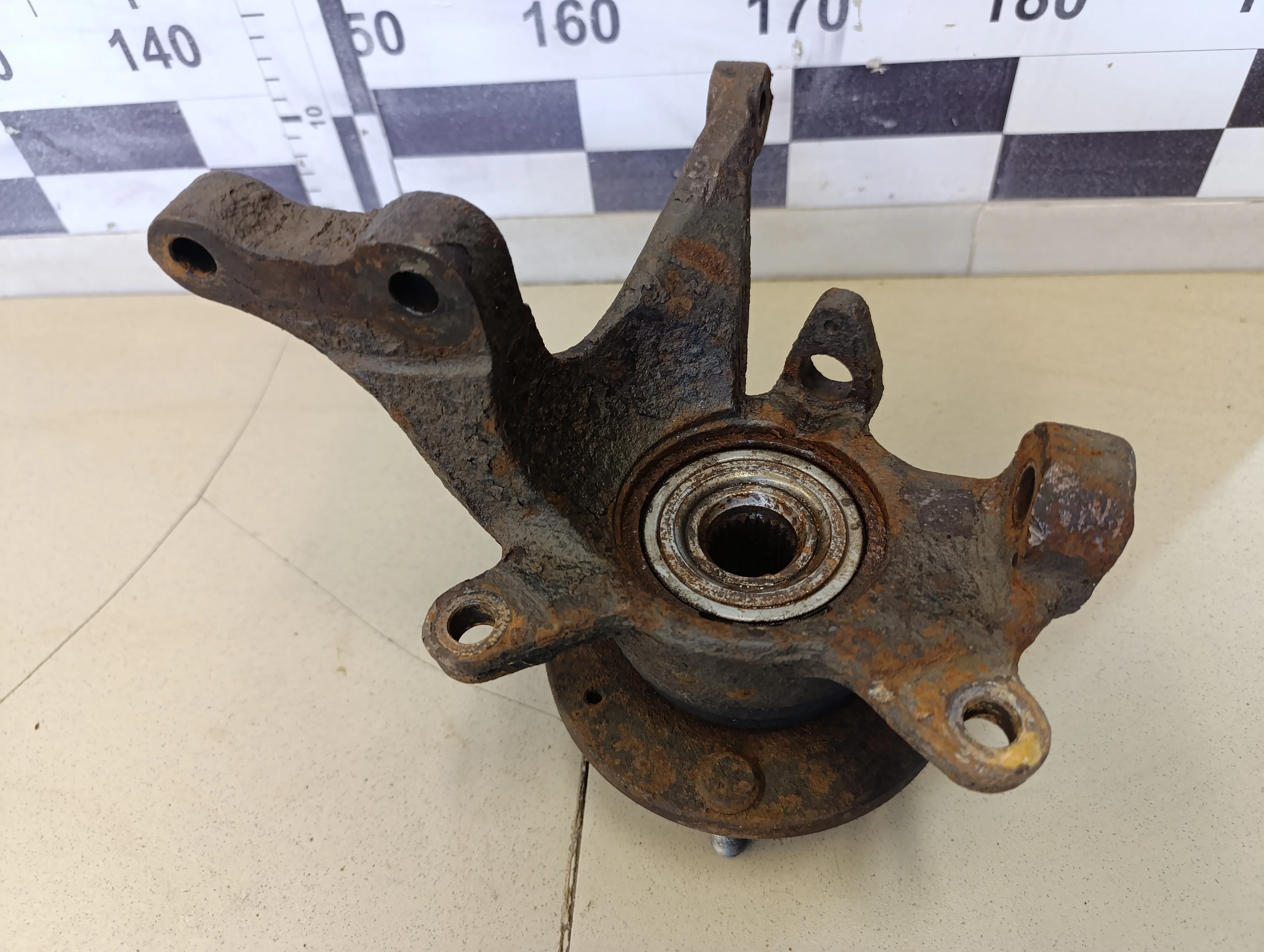 Кулак поворотный передний правый Cerato 2004-2008