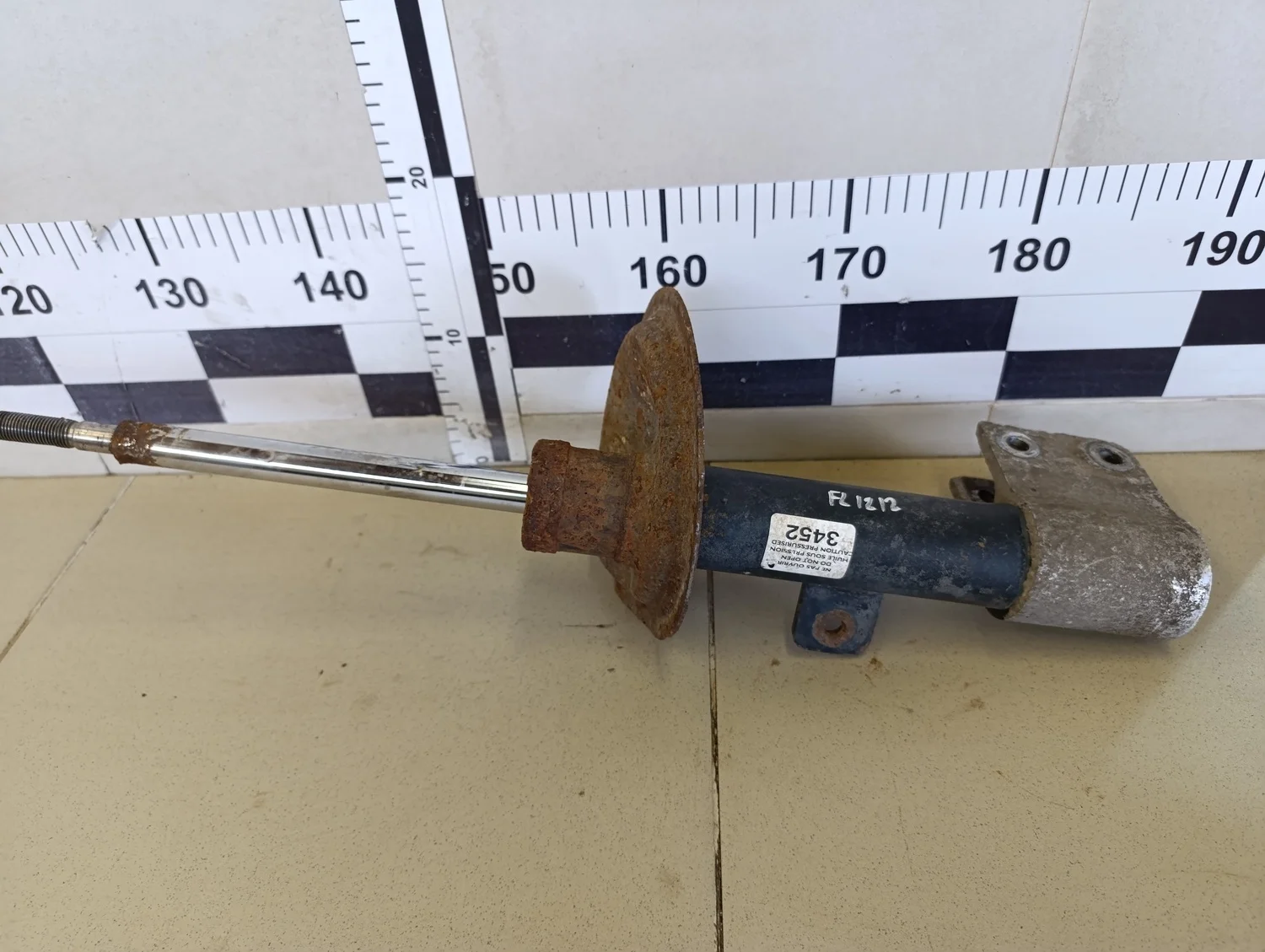 Амортизатор передний левый C4 2005-2011