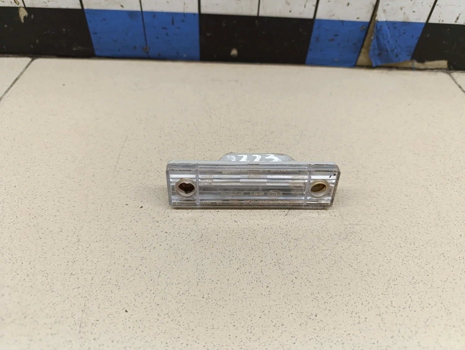 Фонарь подсветки номера Aveo (T200) 2003-2008