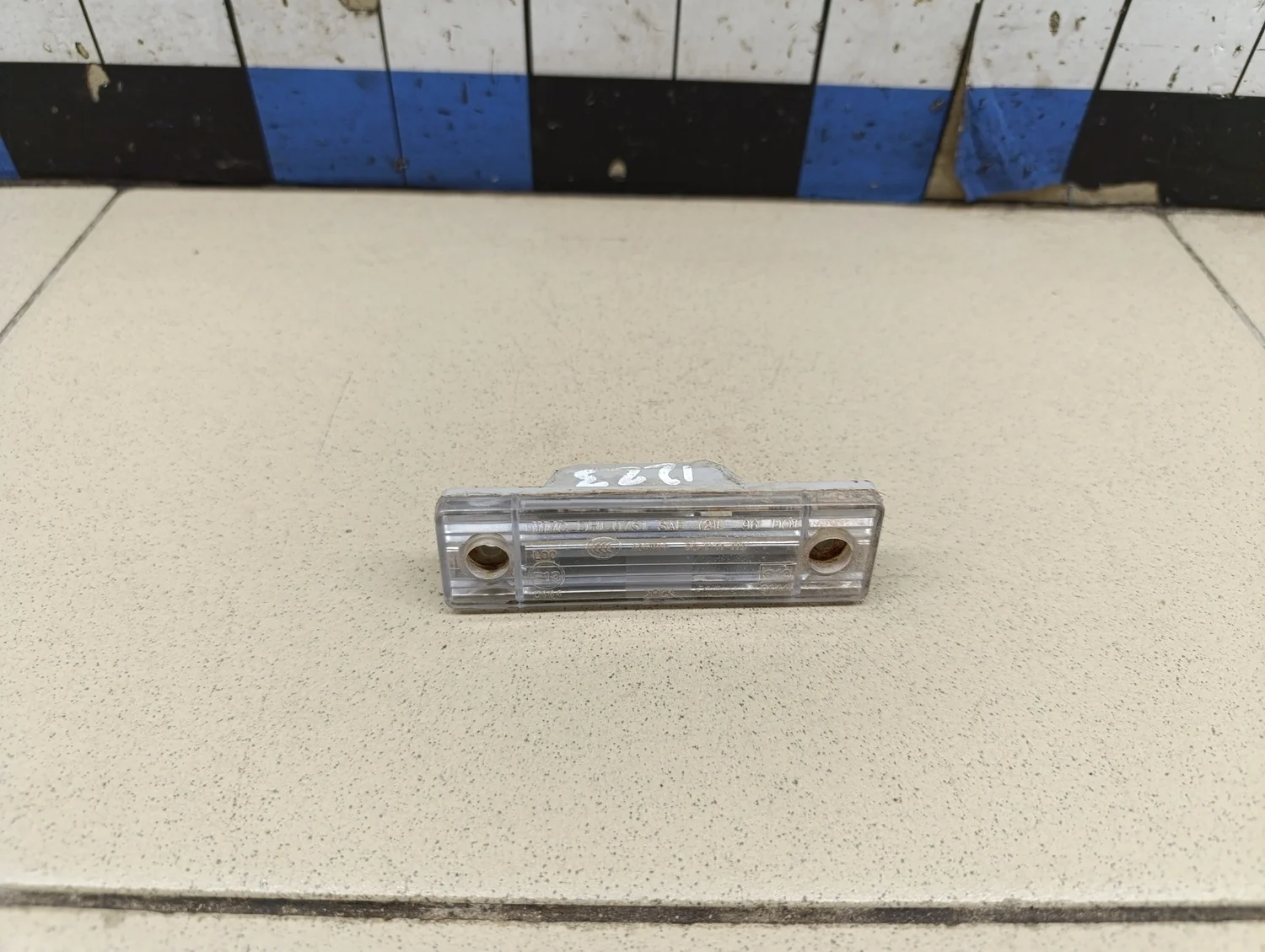 Фонарь подсветки номера Aveo (T200) 2003-2008