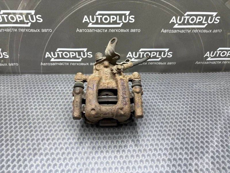 Суппорт тормозной Skoda Octavia 2011 1K0615423J ЛИФТБЭК А5 1.4 CAXA, задний левый