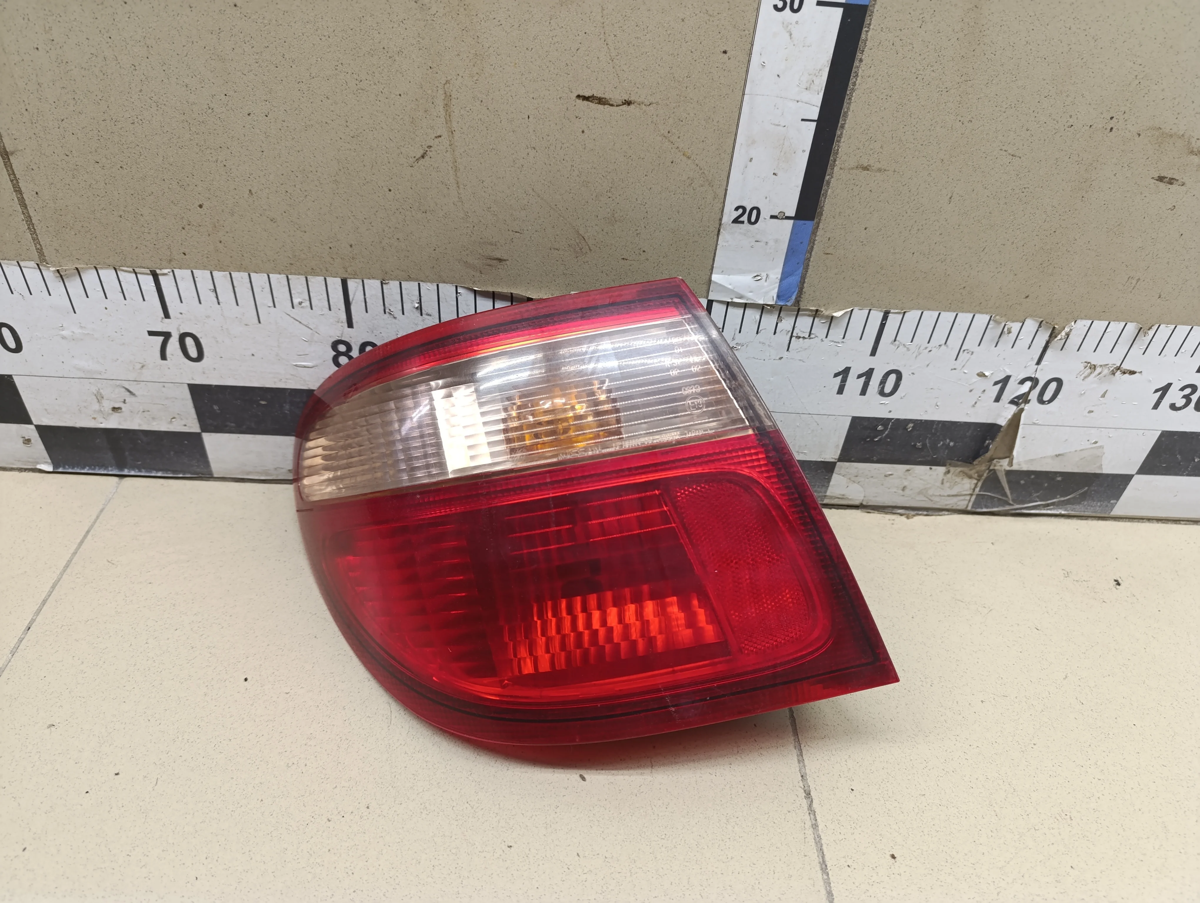 Фонарь задний наружный левый Almera N16 2000-2006