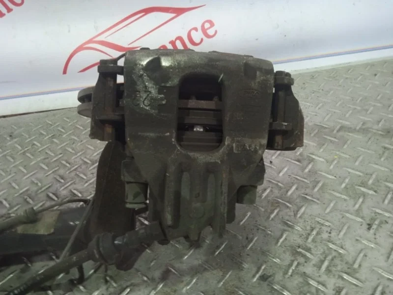 Суппорт тормозной Ford Focus 1