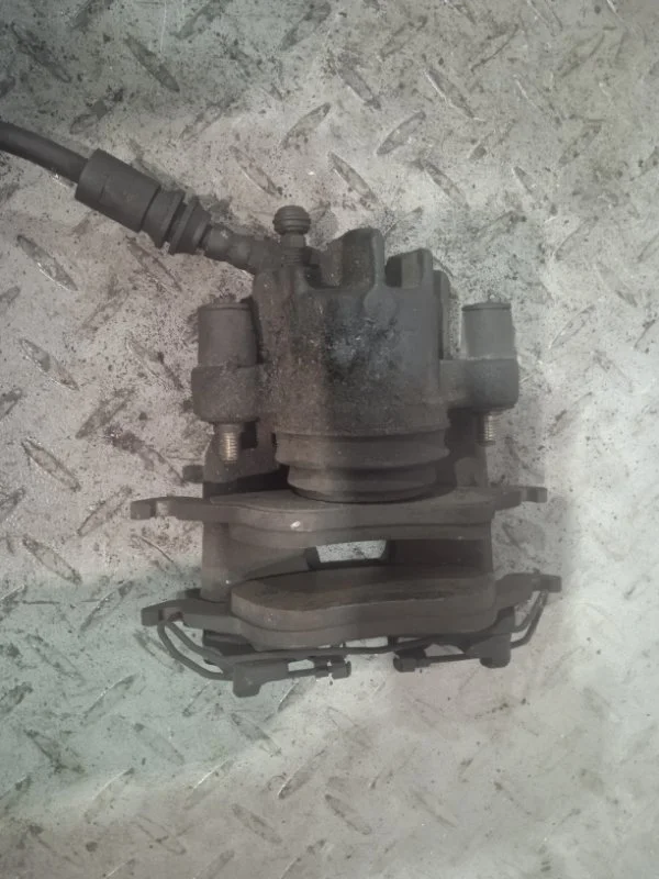 Суппорт тормозной Ford Focus 1