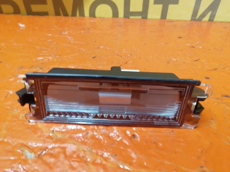 Фонарь подсветки заднего номера Renault Logan 2004-2009 7700433414 LS0G