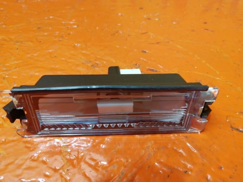 Фонарь подсветки заднего номера Renault Logan 2004-2009 7700433414 LS0G