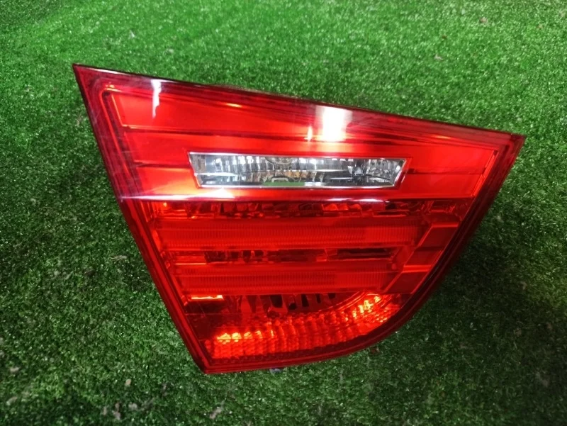 Фонарь в крышку багажника BMW E90