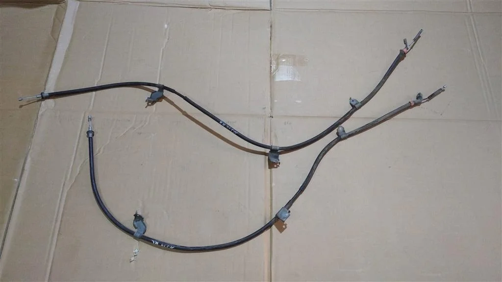 Б.у. трос стояночного тормоза (2шт) NISSAN QASHQAI J10 NISSAN QASHQAI J10