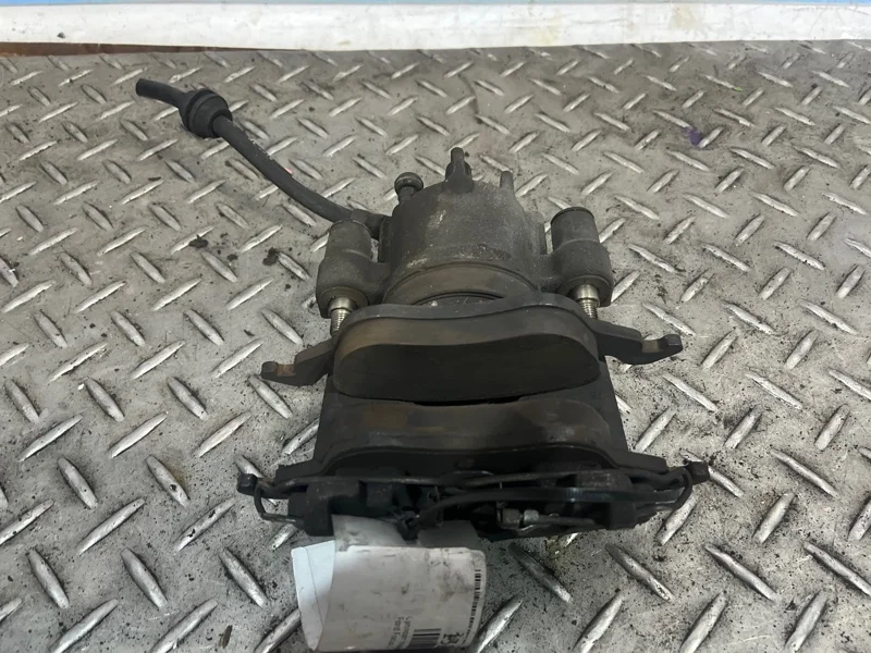 Суппорт тормозной Ford Focus 1