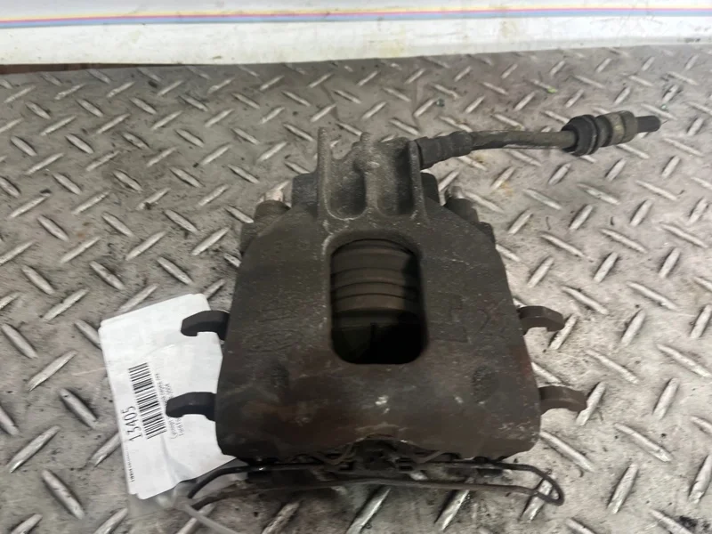 Суппорт тормозной Ford Focus 1998-2004