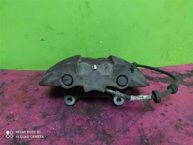 Суппорт передний левый для Audi A6 C7 2010-2018 на фотографиях