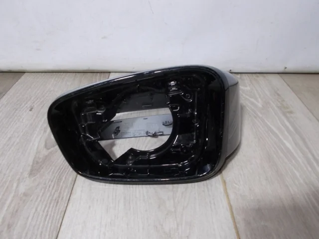 Накладка зеркала левого для BMW 5er G30 2016-2023 на фотографиях